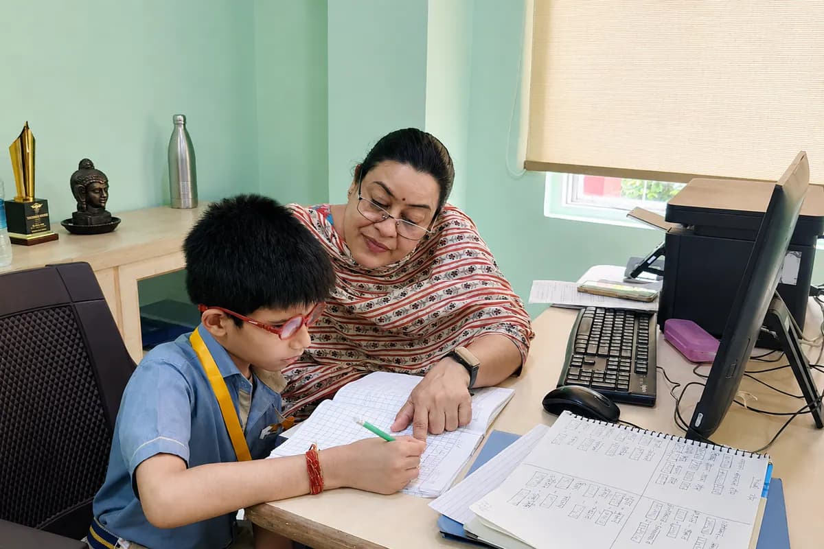 A special educator providing individualised support to a student