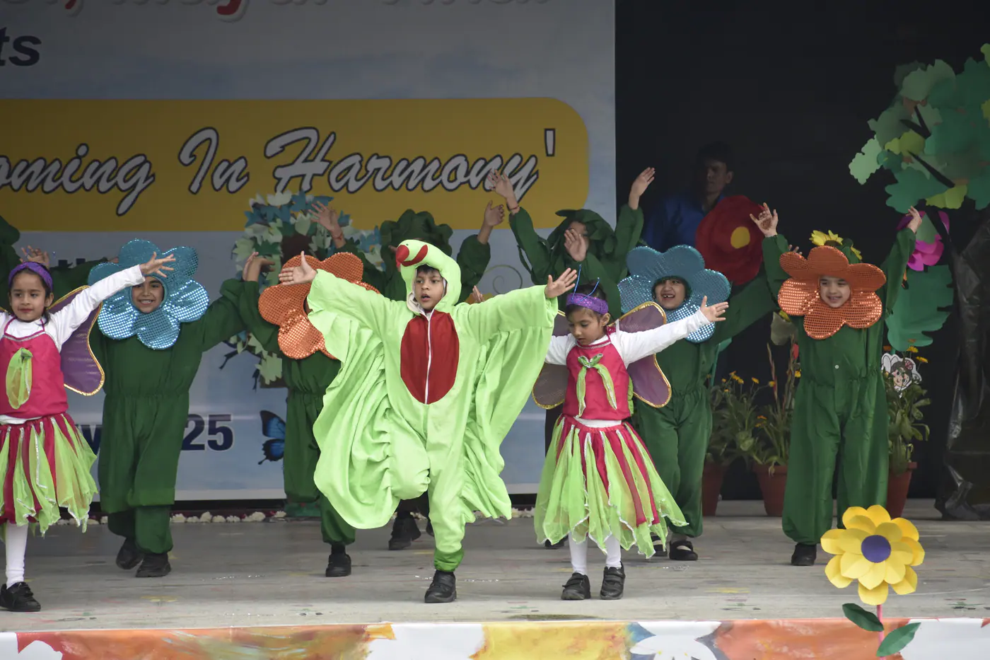 Young students performing on stage
