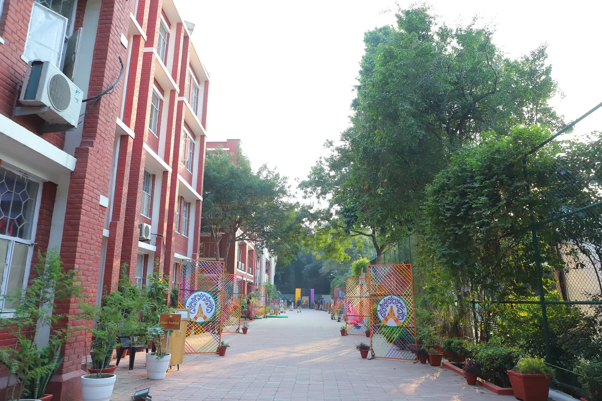 Students walking through the green Salwan Public School campus