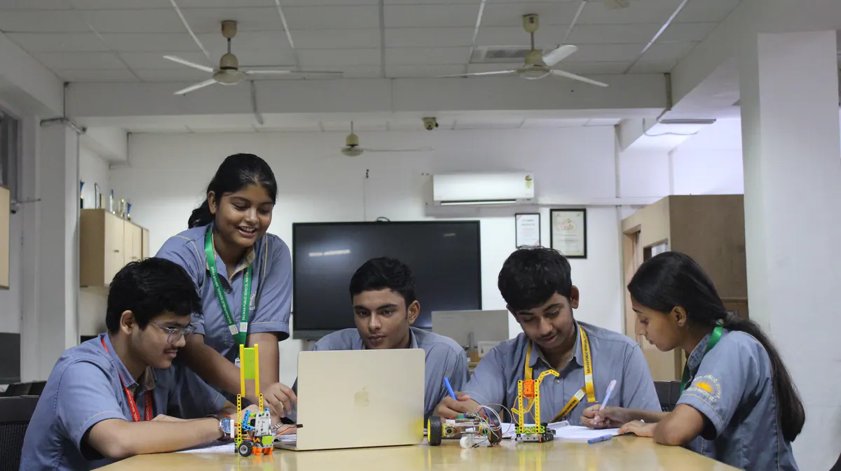 Students collaborating on a practical learning project