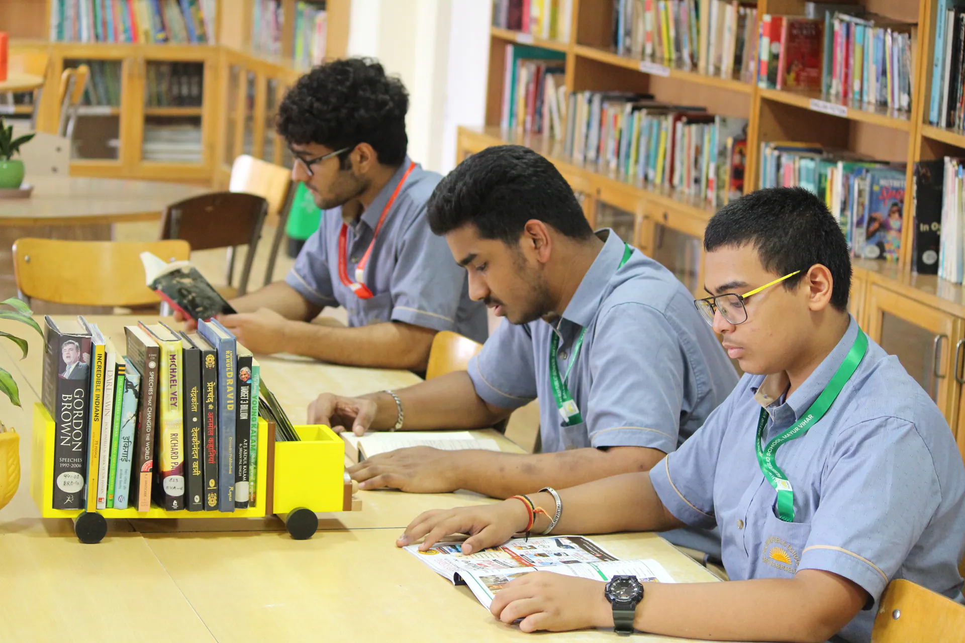 Students reading and studying in the school library