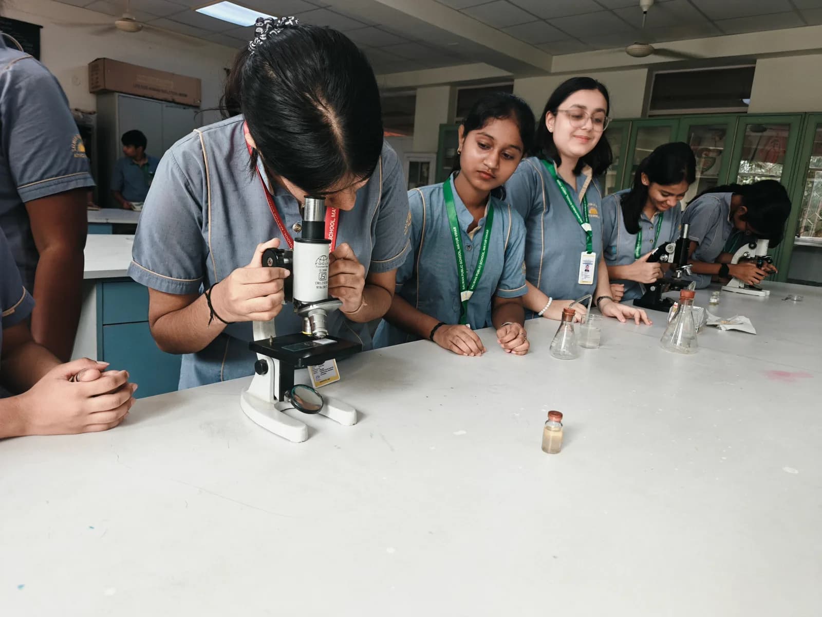 Biology laboratory with student work benches and specimen apparatus