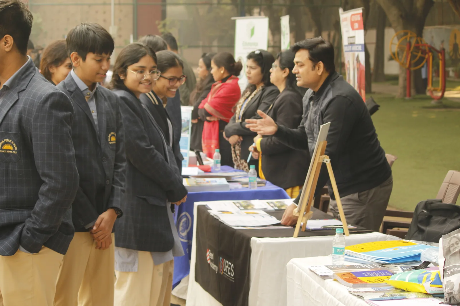Students exploring higher-education options with a counsellor