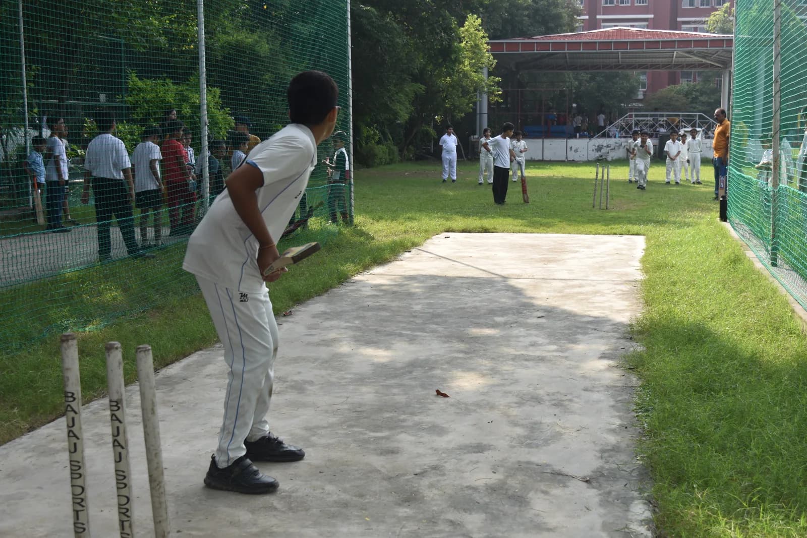 Cricket practice under way on the school ground