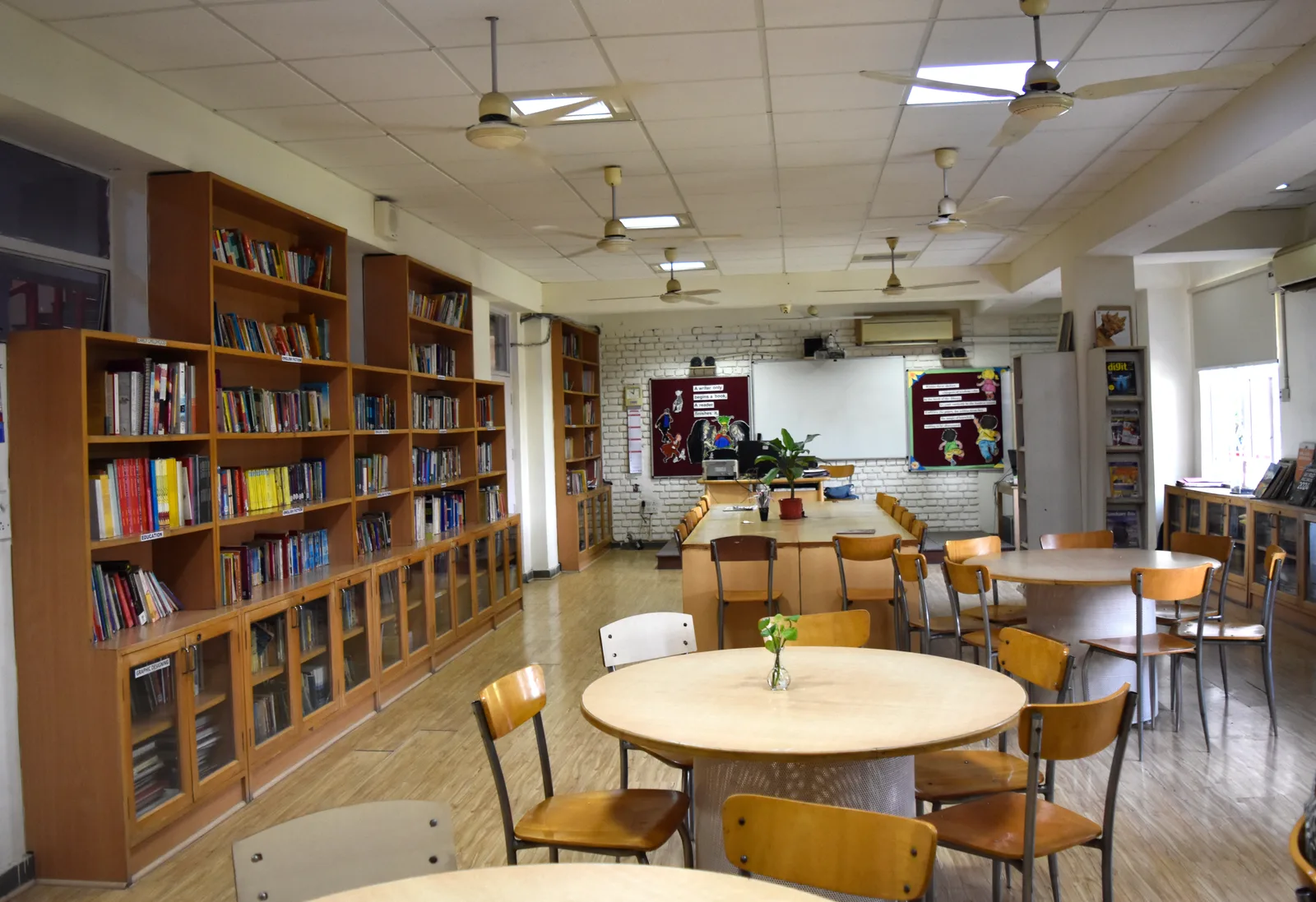 Students reading at the library’s study tables