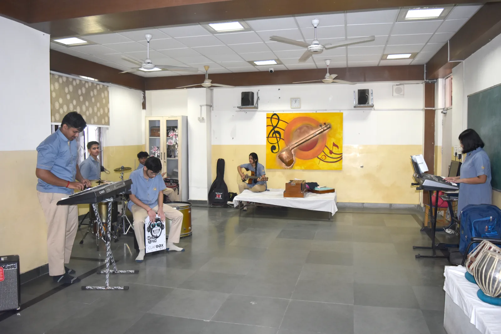 Students practising together in the music room