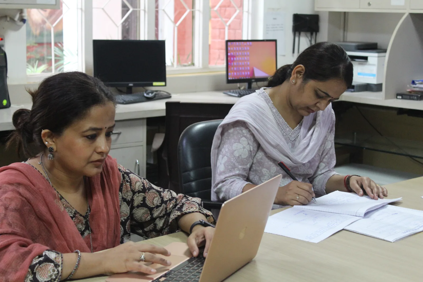 Teachers’ workspace with a shared discussion table